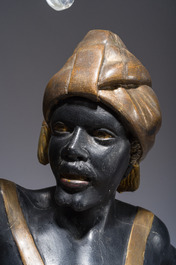 Grande paire de torch&egrave;res dites 'Aux Maures' &agrave; cinq lumi&egrave;res en bois sculpt&eacute; et polychrom&eacute;, Italie, Venise, vers 1900