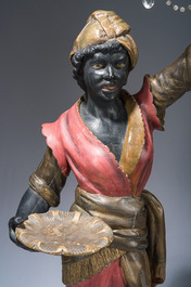 Grande paire de torch&egrave;res dites 'Aux Maures' &agrave; cinq lumi&egrave;res en bois sculpt&eacute; et polychrom&eacute;, Italie, Venise, vers 1900
