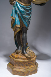 Grande paire de torch&egrave;res dites 'Aux Maures' &agrave; cinq lumi&egrave;res en bois sculpt&eacute; et polychrom&eacute;, Italie, Venise, vers 1900