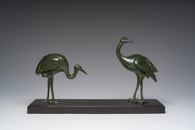 Alexandre Levasseur (19&egrave;me/20&egrave;me si&egrave;cle): Sculpture Art D&eacute;co de Deux &eacute;chassiers, bronze &agrave; patine verte reposant sur une base en marbre noir