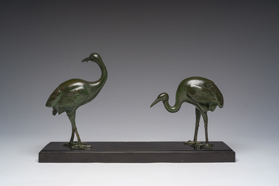 Alexandre Levasseur (19&egrave;me/20&egrave;me si&egrave;cle): Sculpture Art D&eacute;co de Deux &eacute;chassiers, bronze &agrave; patine verte reposant sur une base en marbre noir