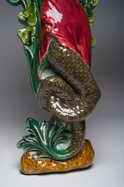 Trois consoles d'appliques en majolique polychrome &agrave; d&eacute;cor d'une sir&egrave;ne, d'un mascaron et d'un blason, une marqu&eacute;e Sarreguemines, France, d&eacute;but 20&egrave;me