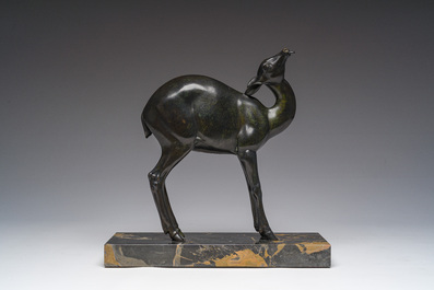 French school: A brown patinated bronze Art Deco sculpture of a doe on a Marmo Portoro marble base, ca. 1920