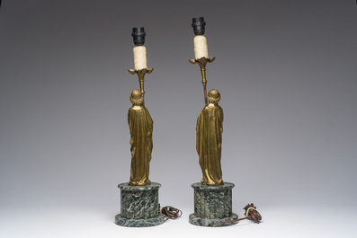 Paire de figures de style n&eacute;o-gothique en bronze dor&eacute; sur un socle en marbre vert de mer transform&eacute;es en chandeliers, France, vers 1900