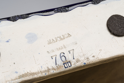 Trois consoles d'appliques en majolique polychrome &agrave; d&eacute;cor d'une sir&egrave;ne, d'un mascaron et d'un blason, une marqu&eacute;e Sarreguemines, France, d&eacute;but 20&egrave;me