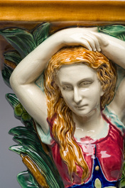 Trois consoles d'appliques en majolique polychrome &agrave; d&eacute;cor d'une sir&egrave;ne, d'un mascaron et d'un blason, une marqu&eacute;e Sarreguemines, France, d&eacute;but 20&egrave;me