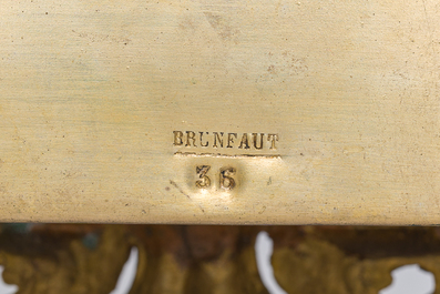 Garniture de chemin&eacute;e en trois pi&egrave;ces en bronze dor&eacute; et marbre noir avec un forgeron, Lagache-Boutillier, Boulogne-sur-Mer, d&eacute;but du 20&egrave;me si&egrave;cle