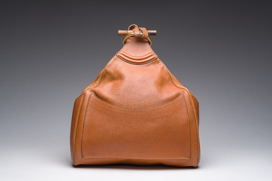 Sac &agrave; dos 'Camel Amandier' en cuir marron avec sa pochette d'origine, Delvaux, 20&egrave;me si&egrave;cle
