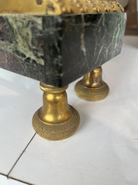 Een Franse Empire verguld bronzen en vert de mer marmeren pendule bekroond met 'L'&eacute;tude de l'astronomie' naar Jean-Andr&eacute; Reiche (1752-1817), 19de eeuw