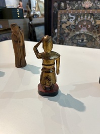 Eight Chinese gilt and polychromed wooden sculptures, 19th/20th C.