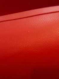 Franz Romero (1951): Een DS-57 Bugatti loungestoel in rood leer en gepolijst aluminium, De Sede, Zwitserland