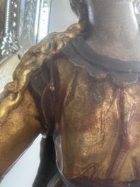 A large polychromed wood sculpture of Saint Elizabeth of Hungary, 18th C.