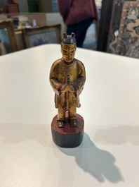 Eight Chinese gilt and polychromed wooden sculptures, 19th/20th C.