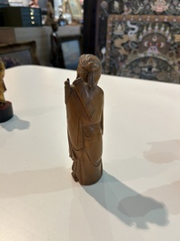 Eight Chinese gilt and polychromed wooden sculptures, 19th/20th C.