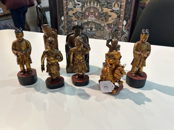 Eight Chinese gilt and polychromed wooden sculptures, 19th/20th C.