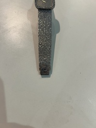 An 18 carat white gold and diamond set Piaget lady's cocktail watch, 20th C.