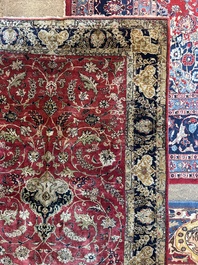 A Persian Isfahan silk rug with floral design, 20th C.