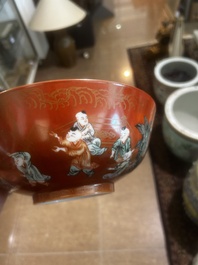 A Chinese coral-red ground famille verte bowl with playing boys, 19th/20th C.