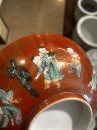 A Chinese coral-red ground famille verte bowl with playing boys, 19th/20th C.