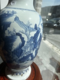A Chinese blue and white vase with figures in a landscape, Kangxi