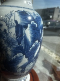 A Chinese blue and white vase with figures in a landscape, Kangxi