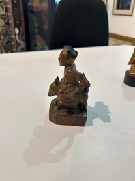 Eight Chinese gilt and polychromed wooden sculptures, 19th/20th C.