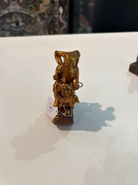 Eight Chinese gilt and polychromed wooden sculptures, 19th/20th C.