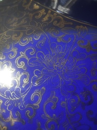 A pair of large Chinese famille rose blue-ground 'dragons and phoenixes' vases with covers, Kangxi mark, 19th C.