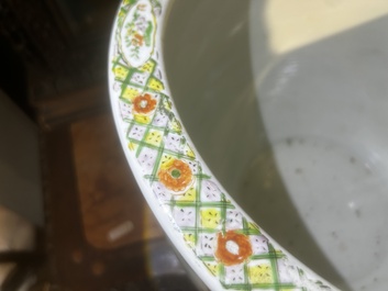 A Chinese famille rose jardini&egrave;re with birds on blossoming branches on an openworked carved wooden stand with marble top, 19th/20th C.