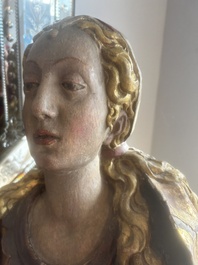 A large polychromed wood sculpture of Saint Elizabeth of Hungary, 18th C.