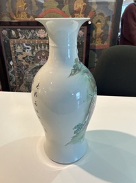 A Chinese famille rose baluster vase with figural design, six-character mark, 20th C.