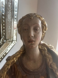 A large polychromed wood sculpture of Saint Elizabeth of Hungary, 18th C.