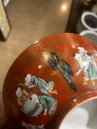A Chinese coral-red ground famille verte bowl with playing boys, 19th/20th C.