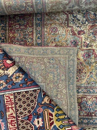 A Persian Kashan 'Mohtashem' silk rug with floral design, early 20th C.