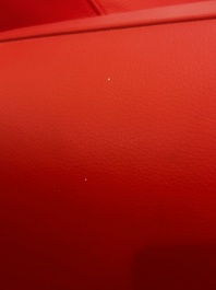 Franz Romero (1951): Een DS-57 Bugatti loungestoel in rood leer en gepolijst aluminium, De Sede, Zwitserland