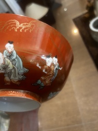 A Chinese coral-red ground famille verte bowl with playing boys, 19th/20th C.