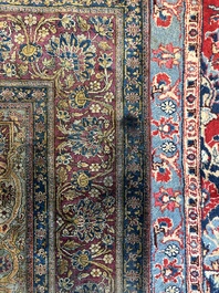 A Persian Kashan 'Mohtashem' silk rug with floral design, early 20th C.