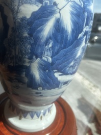 A Chinese blue and white vase with figures in a landscape, Kangxi