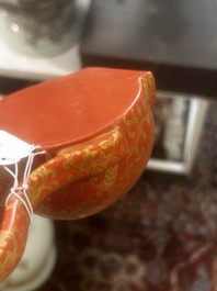 A Chinese ewer-shaped coral-red ground wall pocket vase with gilt lotus scrolls, Qianlong mark, 20th C.
