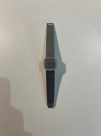 An 18 carat white gold and diamond set Piaget lady's cocktail watch, 20th C.