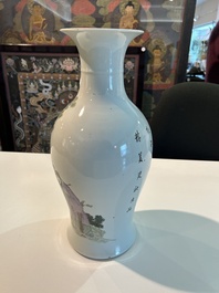 A Chinese famille rose baluster vase with figural design, six-character mark, 20th C.