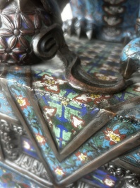 A pair of Chinese cloisonn&eacute; Buddhist lions on a wooden base, 20th C.