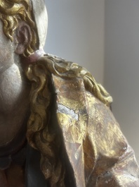 A large polychromed wood sculpture of Saint Elizabeth of Hungary, 18th C.