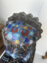 A pair of Chinese cloisonn&eacute; Buddhist lions on a wooden base, 20th C.
