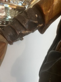 A large polychromed wood sculpture of Saint Elizabeth of Hungary, 18th C.