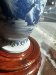A Chinese blue and white vase with figures in a landscape, Kangxi