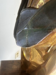 A large polychromed wood sculpture of Saint Elizabeth of Hungary, 18th C.