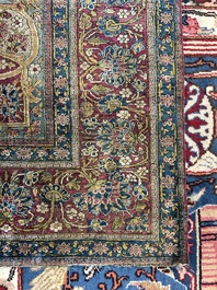 A Persian Kashan 'Mohtashem' silk rug with floral design, early 20th C.