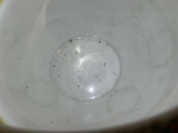 A Chinese famille rose jardini&egrave;re with birds on blossoming branches on an openworked carved wooden stand with marble top, 19th/20th C.