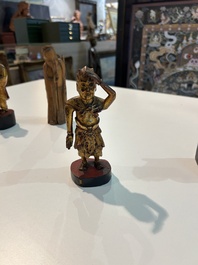 Eight Chinese gilt and polychromed wooden sculptures, 19th/20th C.